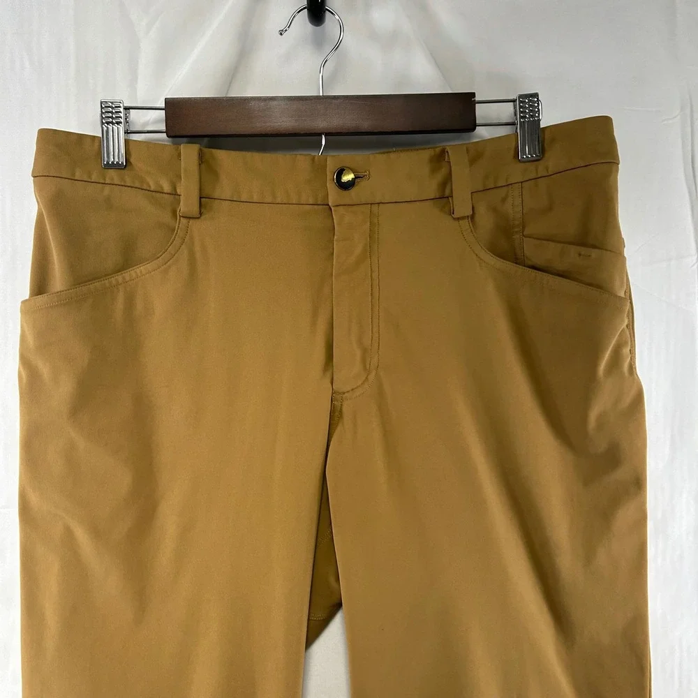Lululemon ABC Pants Mens 33 Mustard Tan Warpstreme Slim Straight Chino